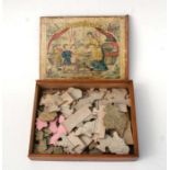 A Victorian boxed jigsaw puzzle, a dissected map of England & Wales with coloured pictorial cover to
