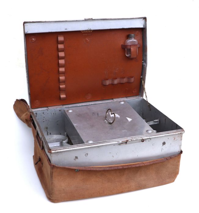 An early 20th century aluminium four-person picnic trunk with partial fitted interior including a