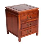 A Chinese hardwood chest of three long drawers, 46cms wide.