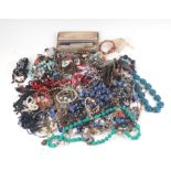 A quantity of costume jewellery to include necklaces and bracelets.