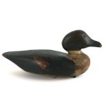 A 19th century painted carved wooden decoy duck, 36cms long.Condition ReportThe head has a small