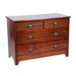 An Edwardian walnut chest of two short and two long drawers, 107cms wide.