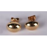 A pair of 9ct gold stud earrings.