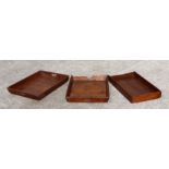 Three WWI waxed pine rectangular trays, stamped '1917', each 63cms wide (3).