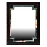 A mahogany framed wall mirror with bevelled glass, 55 by 70cms.
