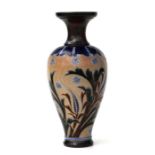 A late 19th / early 20th century Royal Doulton baluster vase decorated with stylised flowers,