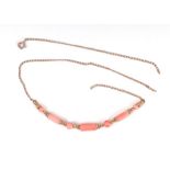 A 9ct gold and coral necklace, total weight 3.9g.