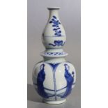 A Chinese blue & white double gourd vase decorated with figures, 19cms high.