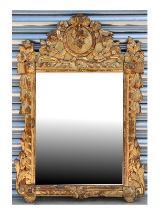 A 19th century carved giltwood wall mirror, overall 54 by 81cms.Condition ReportThe plate size is