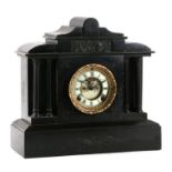 A Victorian American Ansonia black slate architectural mantle clock, 39cms wide.