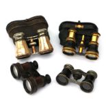 Four pairs of early 20th century opera glasses / binoculars including two pairs in their original