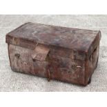 A large leather trunk with brass catch, 76cms wide.