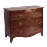 A Regency mahogany bowfronted chest with brushing slides above three long graduated drawers, on