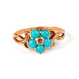 An unmarked gold turquoise and ruby cluster ring, approx UK size 'M', 1.5g.