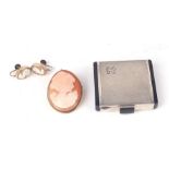 An Art Deco silver ladies compact together with a silver gilt cameo brooch and a pair of cameo