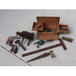 A quantity of vintage tools; together with a teak box with cantilevered interior.