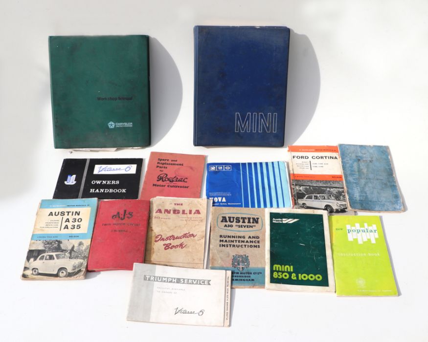 Assorted motoring handbooks and workshop manuals to include an original Mini Workshop manual,