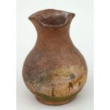 A Verwood type pottery vase with pinched rim, 12cms high.