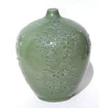 A large Asian celadon glaze vase decorated with flowers, 43cms high.