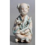 A Chinese part glazed pottery figure depicting a seated young girl holding a sceptre, 13cms high.