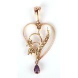 A 9ct gold Art Nouveau amethyst and seed pearl pendant, 1.8g.Condition ReportGood overall