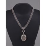 A Victorian silver choker necklace with locket, 41.4g.Condition ReportThe choker is approximately