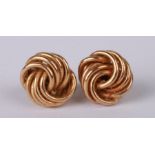 A pair of 9ct gold knot stud earrings.