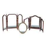 A mahogany triptych dressing table mirror; together with another similar smaller and a gilt framed