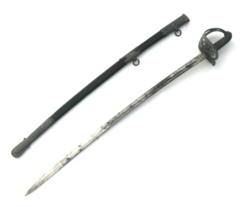 A Victorian Cavalry officers sword with shagreen wire bound handle and leather scabbard, 98cms