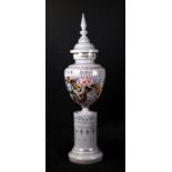 A Harrach Bohemian glass vase and cover with floral and gilt decoration, mounted on a column,