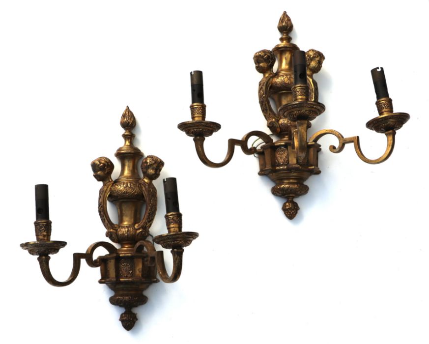 Two of cast brass rococo style wall lights, one two arm the other three arm. 45cms high (2).