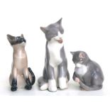 A group of Bing & Grøndahl figures of cats, the largest 18cms high (3).
