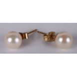 A pair of 9ct gold pearl stud earrings.