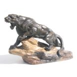 Armand Fagotto (19th / 20th century French) a bronzed pottery figure of a tiger on a naturalistic