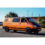 A 1992 Volkswagen T4 camper van, registration J42 SPF, orange. This 2.5 non turbo t4 camper van with