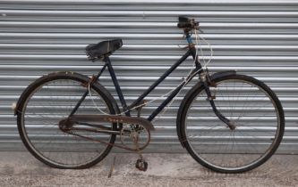 A vintage BSA ladies bicycle with Sturmey Archer three-speed gears, full mud guards and sprung