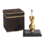A South American gilt Poporo Quimbaya or Indigenous vase on a marble plinth, boxed, 15cms high, with