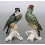 A Karl Ens figure of a green woodpecker perched on a tree stump, 25cms high; together with a Karl