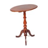 A Victorian mahogany tilt-top occasional table on turned column and tripod base, 54cms wide.