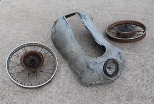 A 1960's motorcycle fibreglass faring / leg shields and a front and rear 20ins diameter spoked