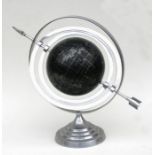 A mid century 12-inch nocturnal terrestrial globe mounted on a stepped circular aluminium base and