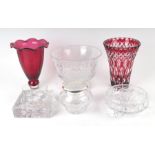 A Bohemian flashed ruby glass vase, 23cms high; together with a cranberry glass vase, 23cms high;