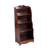 A mahogany waterfall bookcase, 47cms wide.Condition ReportHeight 102cms, width 46cms and depth
