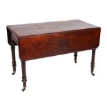 A 19th century mahogany Pembroke table with single end drawer, on tapering ring turned legs, 91cms