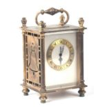 A brass cased Bucherer carriage type clock, 16cms high.
