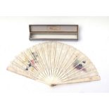 A late 19th century carved bone and painted lace fan decorated with birds and flowers, 35cms long,