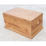 A pine and teak blanket box, 94cms wide.