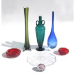 A collection of Studio glassware to include a green cased candlestick of cylindrical waisted form,