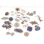 A quantity of costume jewellery, brooches, clips and earrings, to include a white metal amethyst