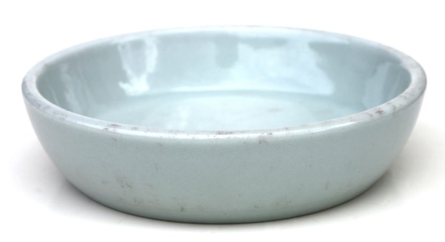 A Chinese pale celadon glaze brush washer, six character blue mark to the underside, 14cms